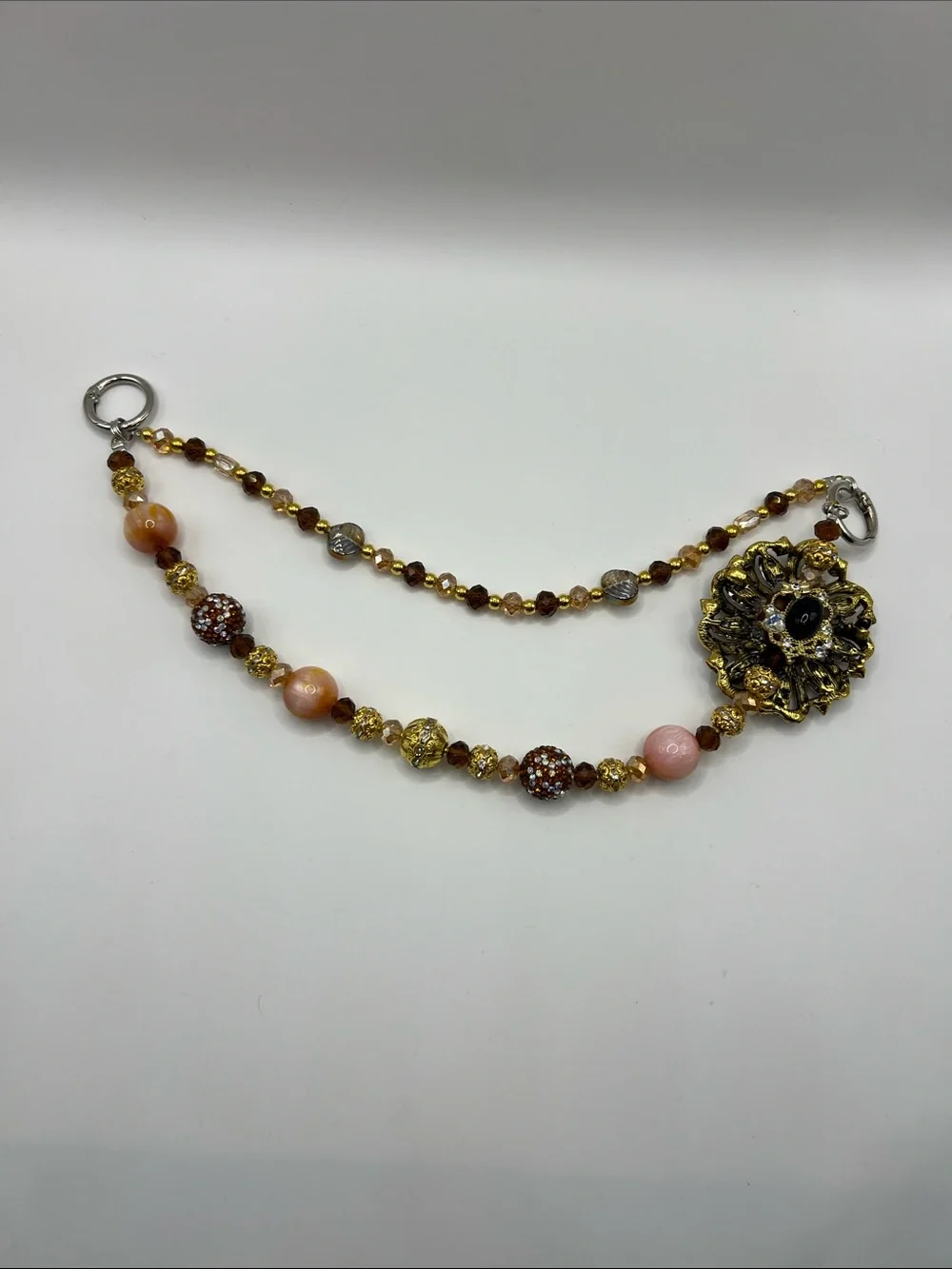 745. Vintage-Inspired Amber Beaded Bag Chain with Floral Accent